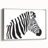 Framed canvas wall art featuring a striking zebra design in silver tones, showcasing a side view of the print, perfect for adding a wild touch to home decor.