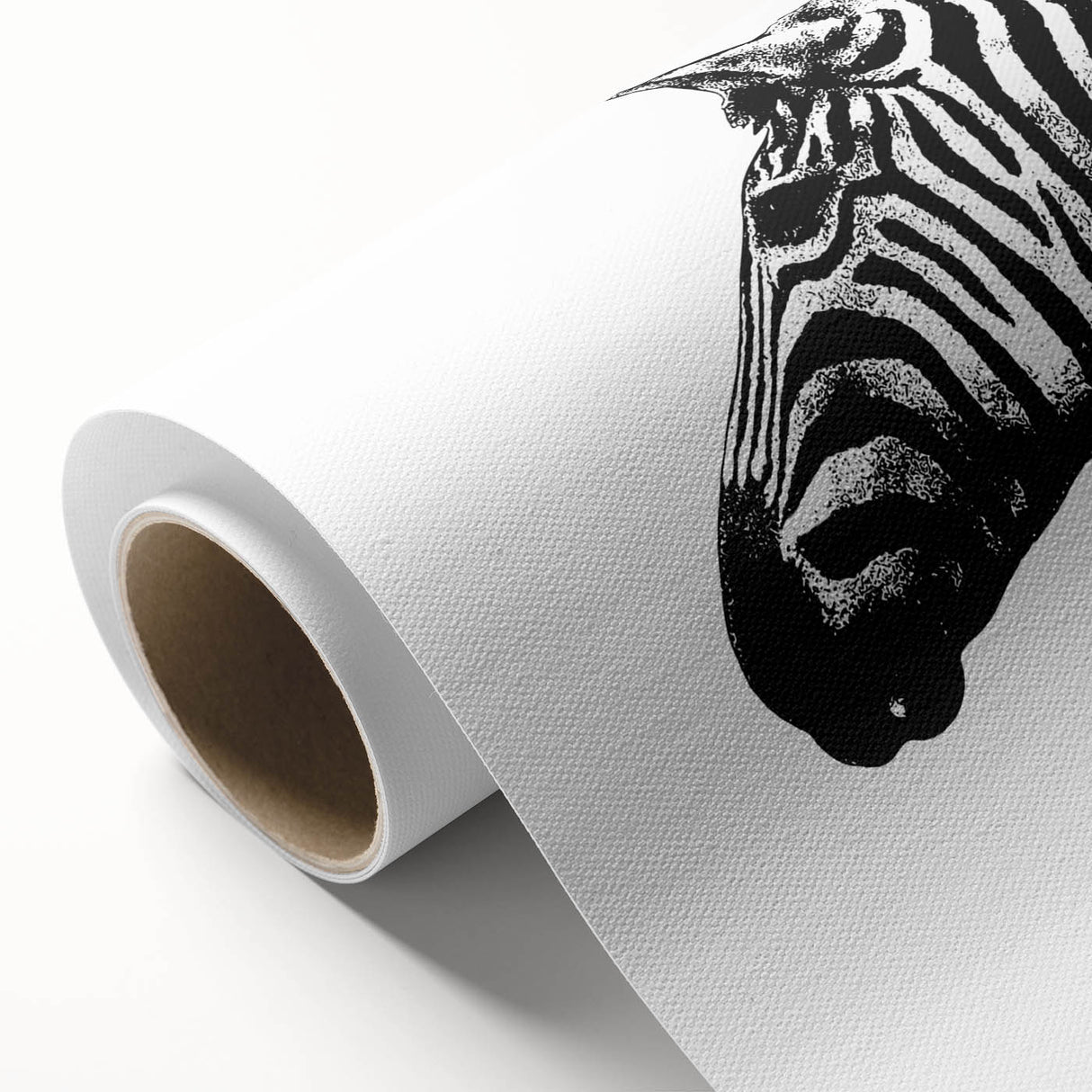 Zebra-themed rolled canvas wall art showcasing a striking black and white design, perfect for animal lovers and modern decor, presented in a protective tube.