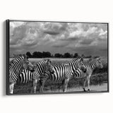 Framed canvas wall art featuring a striking zebra design in black and white, showcasing intricate details and textures, perfect for wildlife enthusiasts' decor.
