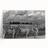 Stretched canvas wall art depicting a vibrant zebra design, showcasing bold black and white stripes with a modern artistic flair, perfect for wildlife enthusiasts.