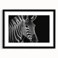Zebra-themed wall art design framed in elegant black, showcasing a striking monochrome pattern perfect for modern home decor. Ideal for animal lovers and art enthusiasts.