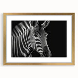 Framed wall art featuring a striking zebra design in gold, showcasing intricate details and vibrant colors, perfect for enhancing modern decor in living spaces.