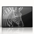 Framed acrylic wall art featuring a striking zebra design in black and white, ideal for wildlife enthusiasts seeking modern decor. Perfect for adding a touch of nature-inspired elegance to any room.