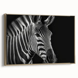 Framed wall art featuring a striking zebra design in black and white, set against a gold background. Perfect for animal lovers and modern decor enthusiasts looking to enhance their living space.