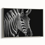 Framed canvas wall art featuring a striking zebra design in black and white, showcasing intricate details and textures, perfect for modern home decor.