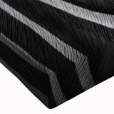 Close-up of a vibrant zebra design stretched canvas wall art, showcasing intricate patterns and bold colors, perfect for modern wildlife decor in homes or offices.