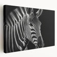 Vibrant stretched canvas wall art showcasing a detailed zebra design in a natural setting, perfect for animal lovers and home decor enthusiasts.