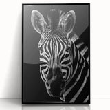 Framed acrylic wall art featuring a striking black and white zebra design, perfect for adding a touch of wildlife elegance to any decor. Ideal for animal lovers and modern interiors.