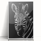 Framed wall art showcasing a striking zebra design in vibrant black and white, ideal for adding a modern touch to any décor. Perfect for animal lovers and art enthusiasts.