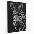 Zebra-themed wall art featuring a striking black and white design, printed on stretched canvas, showcasing detailed textures and vibrant colors, ideal for home decor.
