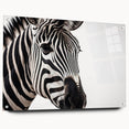 Side view of a modern wall art collection featuring a striking zebra design, crafted from acrylic glass, elegantly displayed with silver pins against a sleek background.