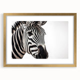 Gold-framed wall art collection featuring a zebra design, showcasing vibrant black and white stripes against a stylish mat, perfect for animal-themed decor.