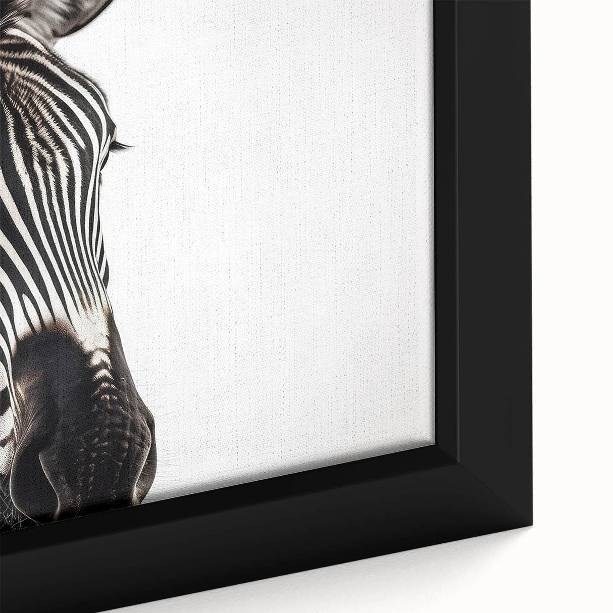 Close-up of a framed canvas wall art piece showcasing a striking zebra design, featuring bold black and white stripes against a textured background, perfect for animal lovers.