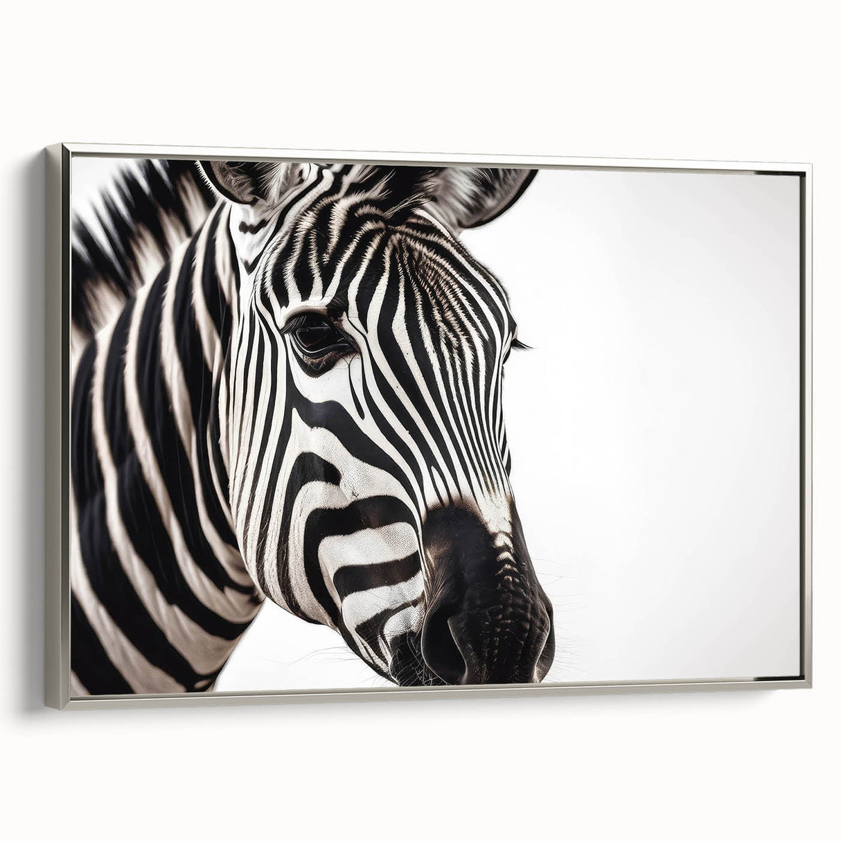 Framed wall art featuring a striking zebra design in a silver frame, showcasing vibrant black and white stripes against a minimalist background, perfect for animal-themed decor.