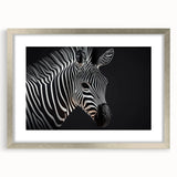 Zebra-themed wall art collection framed in silver, showcasing a sleek design with a white mat, perfect for adding a touch of wildlife elegance to home decor.