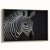 Framed wall art showcasing a stylish zebra design in a gold frame, perfect for animal-themed decor. The canvas features a modern aesthetic, enhancing any interior space.