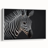 Framed canvas wall art showcasing a striking zebra design in black and white, perfect for animal lovers and modern home decor. Ideal for enhancing living spaces with wildlife themes.