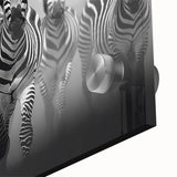 Close-up of a striking zebra design wall art piece, showcasing bold black and white stripes on acrylic glass, perfect for wildlife-themed decor in modern interiors.