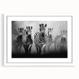 Framed wall art featuring a minimalistic zebra design in black and white, set against a white mat, perfect for modern home decor and wildlife enthusiasts.