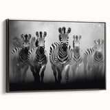 Framed canvas wall art showcasing a striking zebra design in black and white, displayed from the side to highlight its modern aesthetic and sleek finish. Perfect for animal lovers and contemporary decor enthusiasts looking to elevate their home or office space.