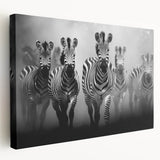 Stretched canvas wall art featuring a vibrant zebra design, showcasing bold black and white stripes with a textured finish, perfect for animal lovers and modern decor.