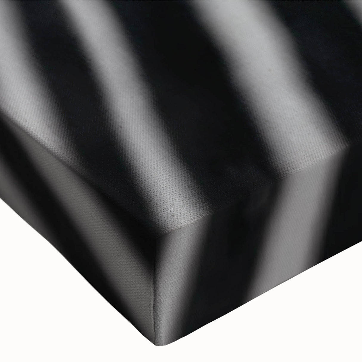 Close-up of a vibrant zebra wall art design on stretched canvas, showcasing intricate black and white patterns. Ideal for wildlife-themed decor, bringing nature indoors.