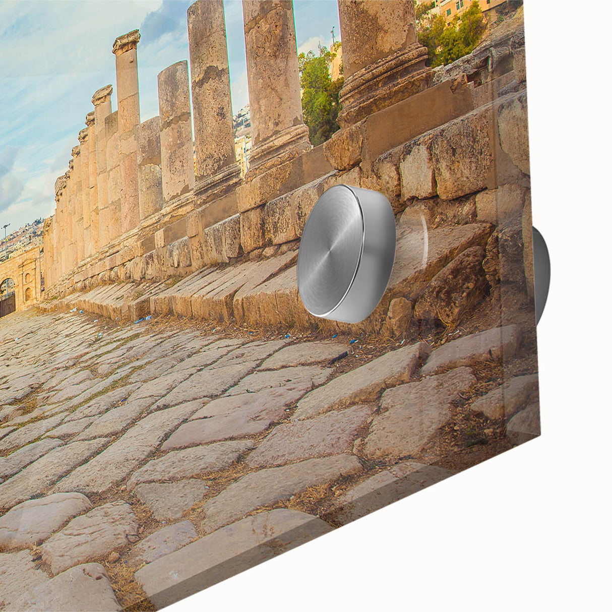 Close-up of large abstract wall art depicting ancient ruins in muted earth tones on acrylic glass.