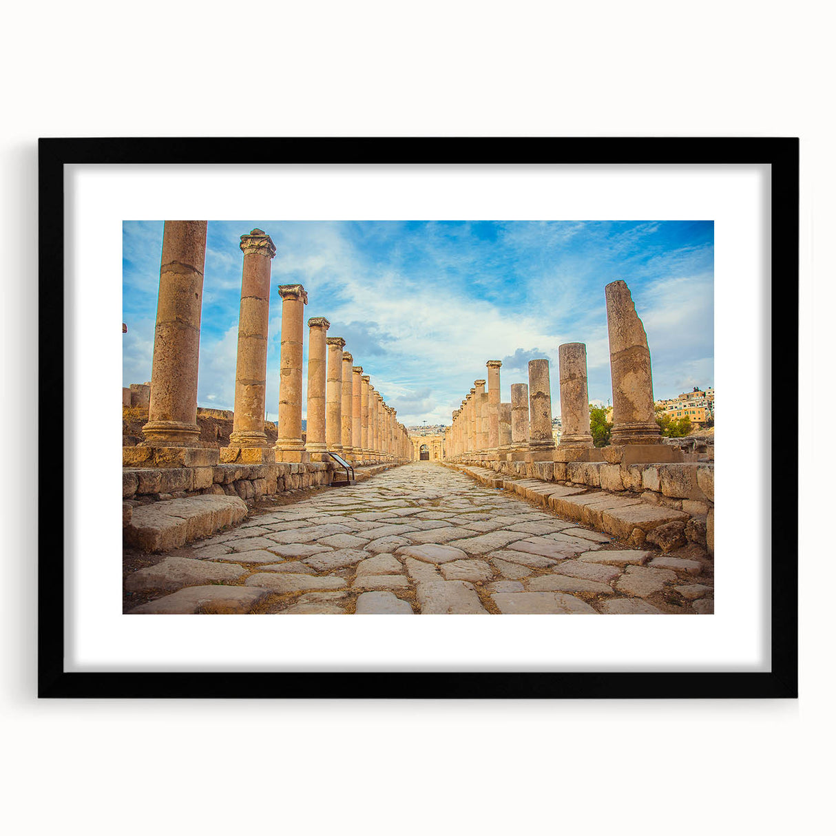 Extra large colorful abstract art print of ancient ruins on textured canvas, framed in black, ideal for living room decor.