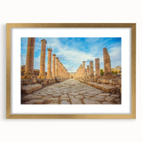 Textured art print of abstract ancient ruins in muted earth tones on a gold-framed canvas, suitable for bedroom decor.