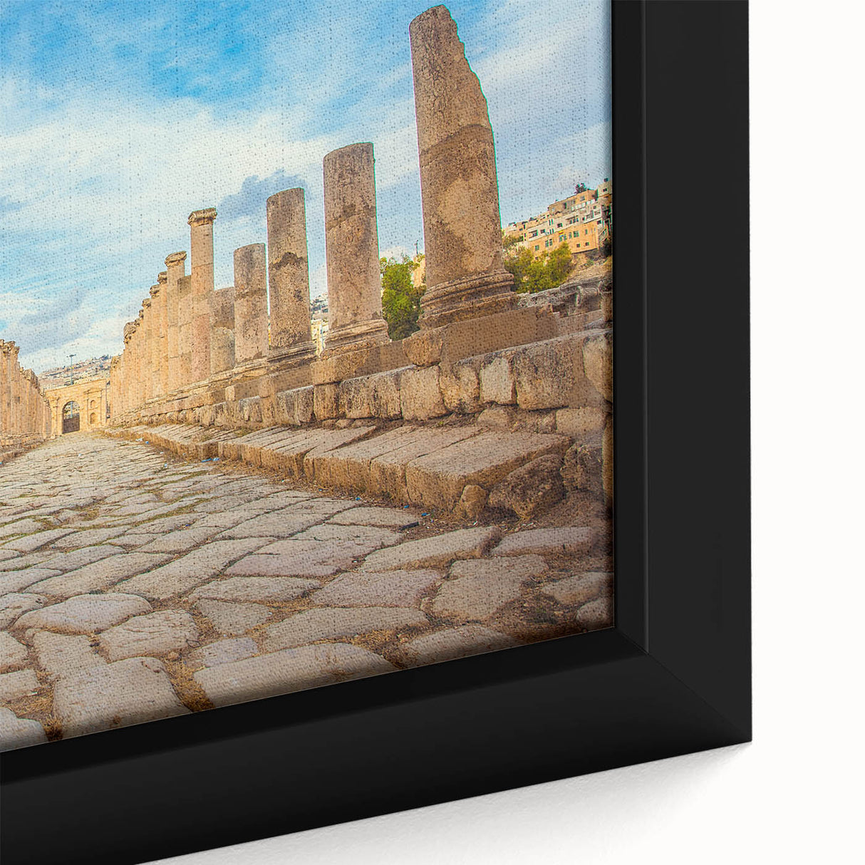 Close-up of a black wall art depicting ancient ruins in textured style, ideal for a living room ambiance.