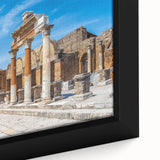Framed canvas featuring a close-up of ancient ruins in textured black with colorful accents, ideal for living room decor.