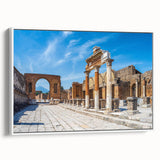 Framed canvas of vintage poster art depicting ancient ruins in vibrant colors, ideal for living room decor.