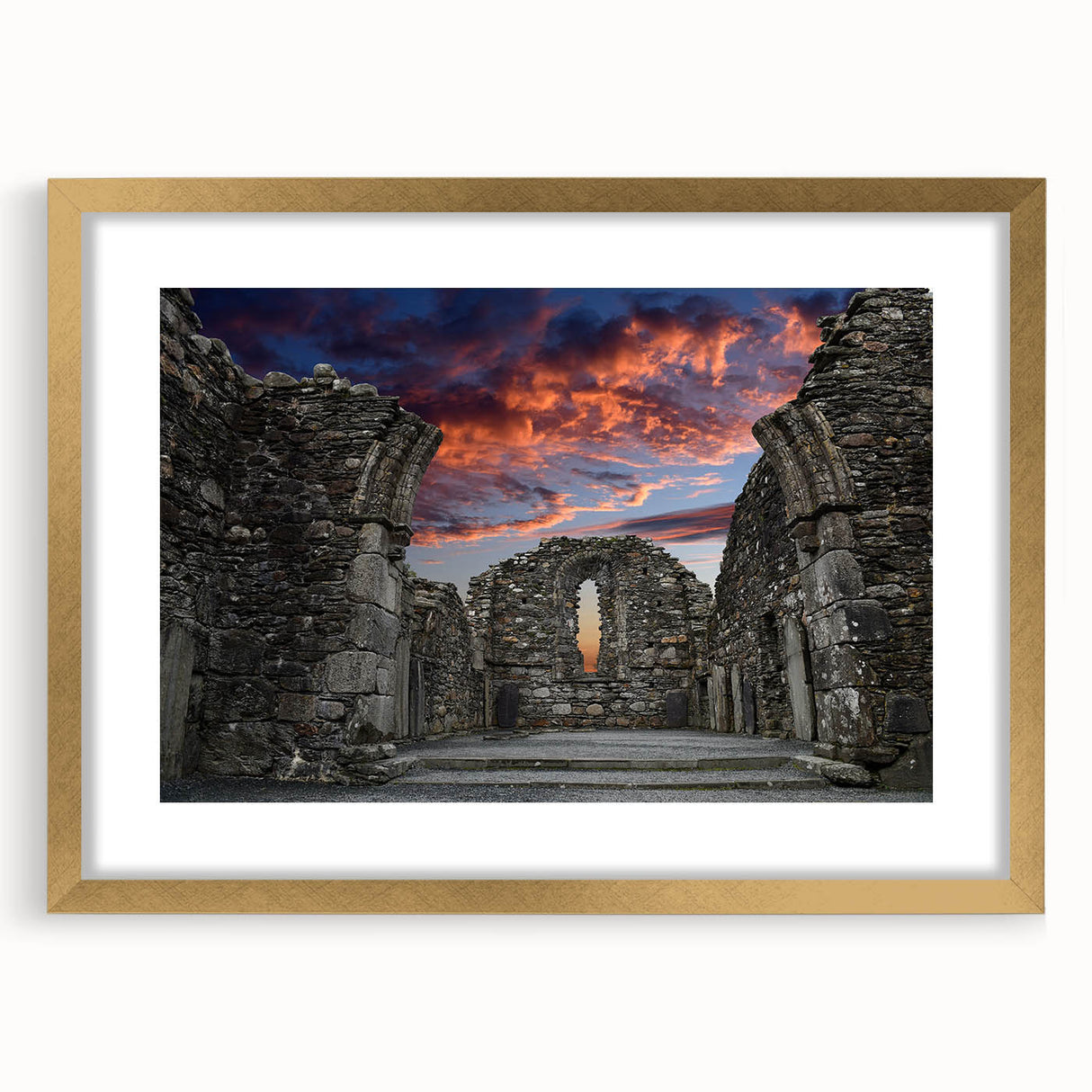 Textured art print of abstract ancient ruins in muted earth tones, framed in gold, ideal for bedroom art.