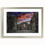 Abstract art print depicting ancient ruins in muted earth tones, silver-framed with mat, suitable for dining room decor.