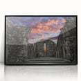 Framed acrylic print of large abstract wall art depicting ancient ruins in muted earth tones.