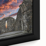 Framed canvas featuring a close-up of ancient ruins in textured black with vibrant color accents.