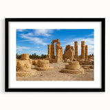 Extra large abstract art print of colorful, textured ancient ruins on a black framed canvas, ideal for living room decor.