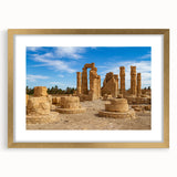 Extra large wall art featuring abstract art prints of ancient ruins in textured beige and gold tones, framed in gold.
