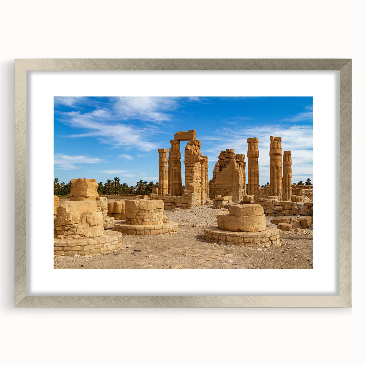 Textured art of ancient ruins in muted earth tones on a framed silver mat, suitable for bedroom decor.