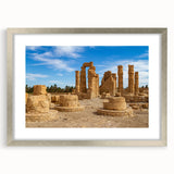 Textured art of ancient ruins in muted earth tones on a framed silver mat, suitable for bedroom decor.