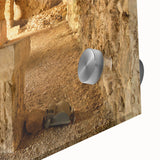 Large abstract wall art of ancient ruins in muted earth tones on acrylic glass, suitable for dining room ambiance.