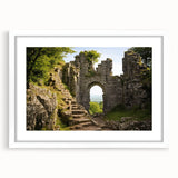 Extra large abstract art print of ancient ruins in textured shades of gray and beige on a white framed canvas.