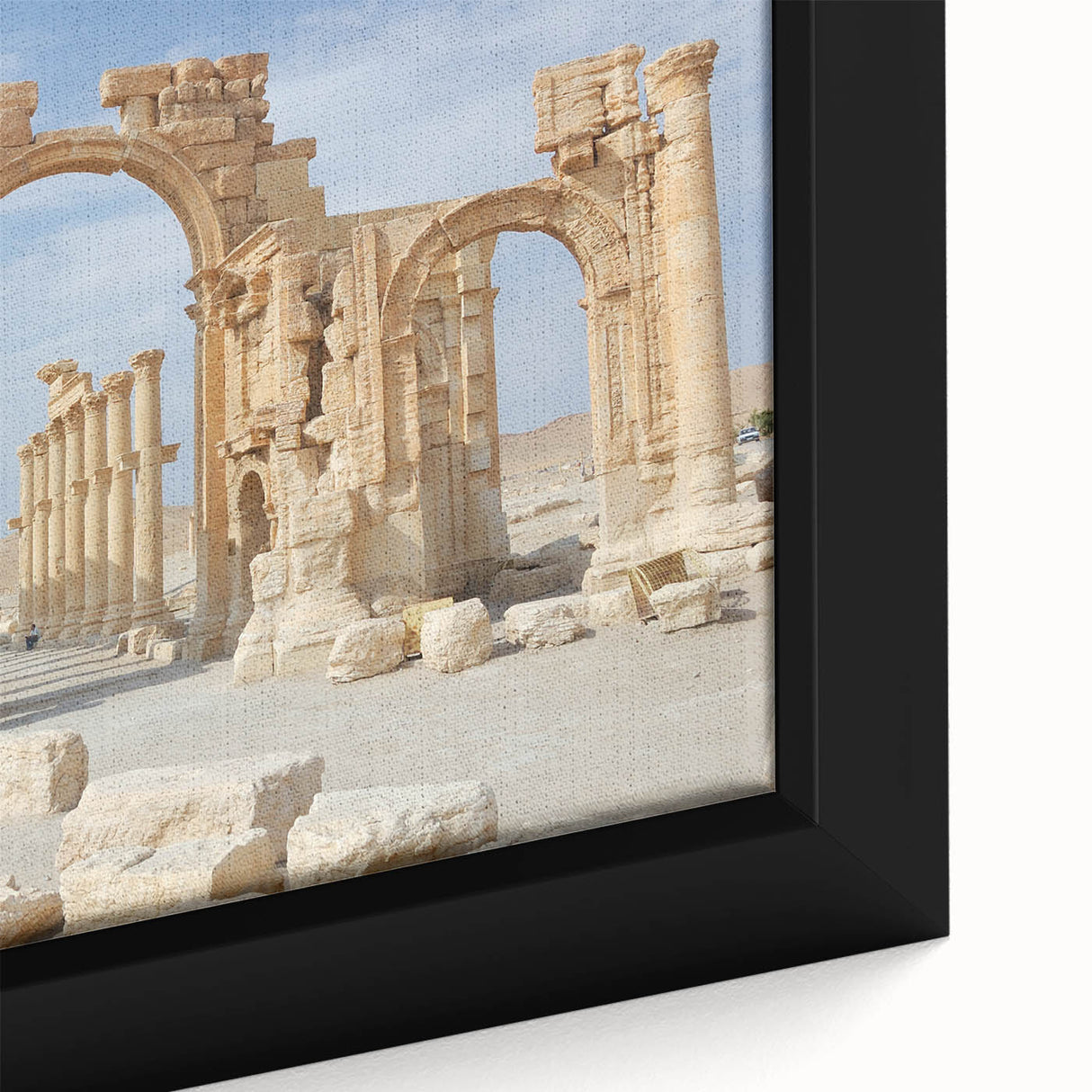 Close-up of a black framed canvas featuring colorful, textured depiction of ancient ruins, ideal for living room decor.