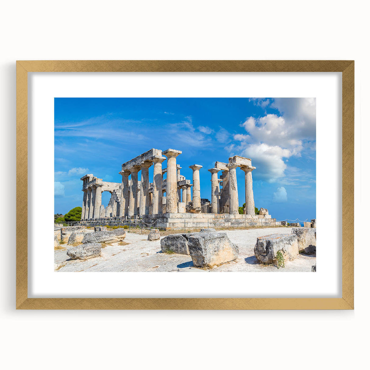 Extra large wall art featuring abstract textured design of ancient ruins in muted earth tones, framed in gold.