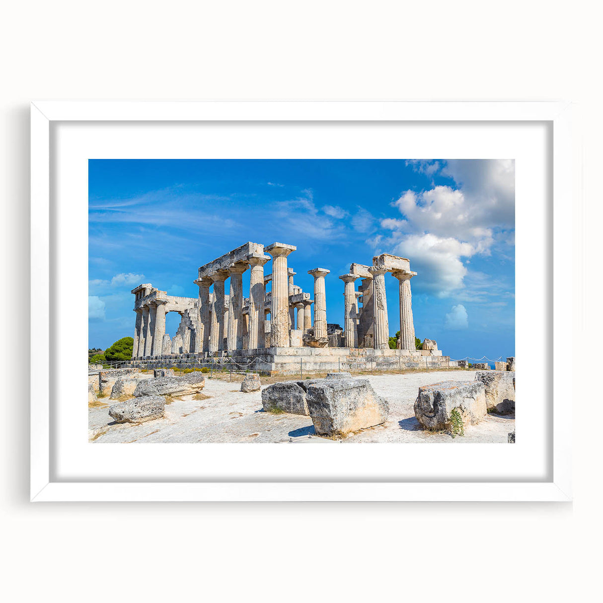 Abstract art print of ancient ruins in muted earth tones on a framed white mat, suitable for dining room decor.