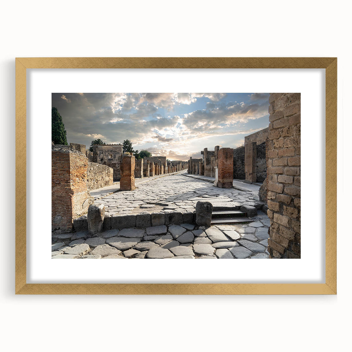 Textured art print of abstract ancient ruins in earth tones, framed in gold, ideal for bedroom decor.