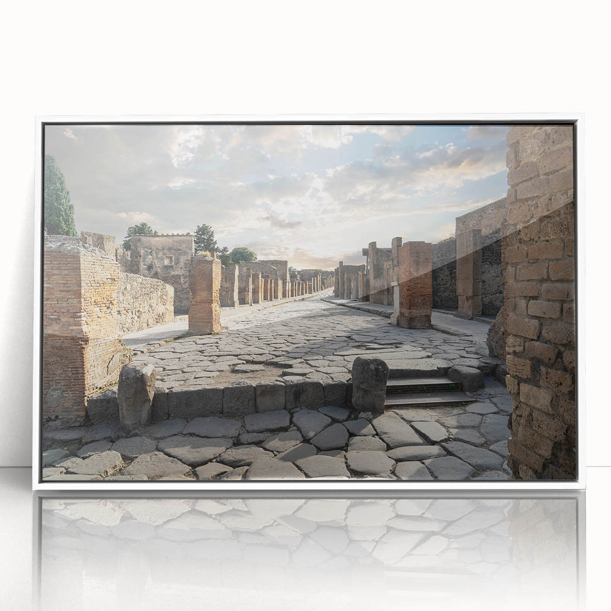 Acrylic print of ancient ruins in muted earth tones, framed in white, suitable for modern art wall decor.