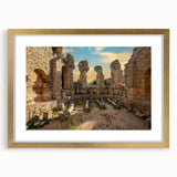 Extra large wall art of ancient ruins in textured gold tones on a framed canvas, ideal for living room decor.