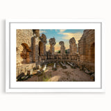 Abstract art print of ancient ruins in muted earth tones on a framed canvas, ideal for dining room decor.