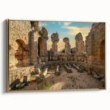 Framed canvas featuring ancient ruins in a landscape, rendered in black with colorful accents, ideal for office decor.